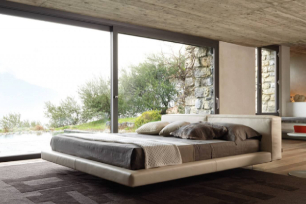 Moderní a příjemná postel Zenit (Désirée) s měkkým čelem inspirovaným pohodlnou pohovkou. 